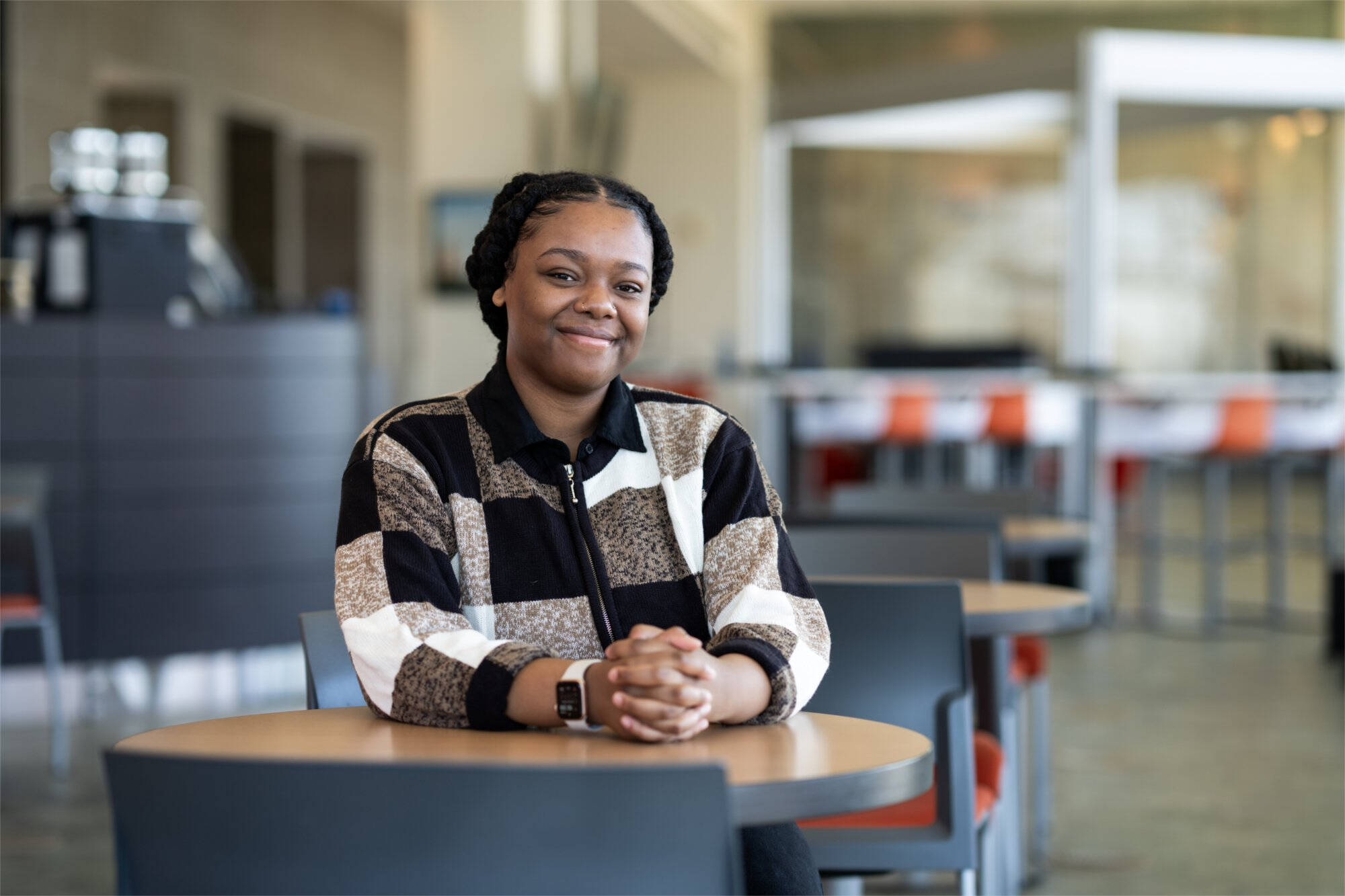 Person smiling at camera.